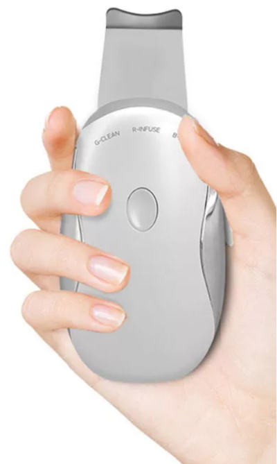 Ultrasonic Skin Scrubber in hand 
